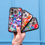 Magsafe-compatible phone cases showcasing beautiful Ukrainian designs by Victoria Radochyna for War Child. | iPhone 15 Pro Max,iPhone 15 Pro,iPhone 14 Pro Max,iPhone 14 Pro,iPhone 15 Plus,iPhone 15,iPhone 14 Plus,iPhone 14